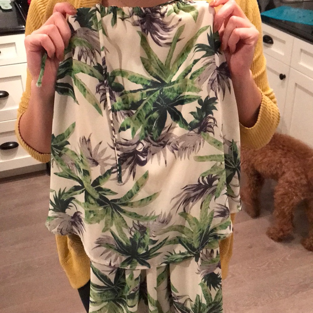 Romper with a palm pattern